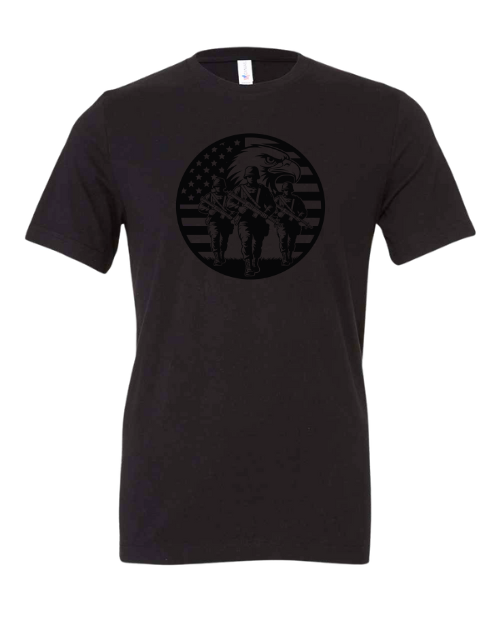 Black t-shirt with a black graphic of two soldiers holding rifles on an American flag background.